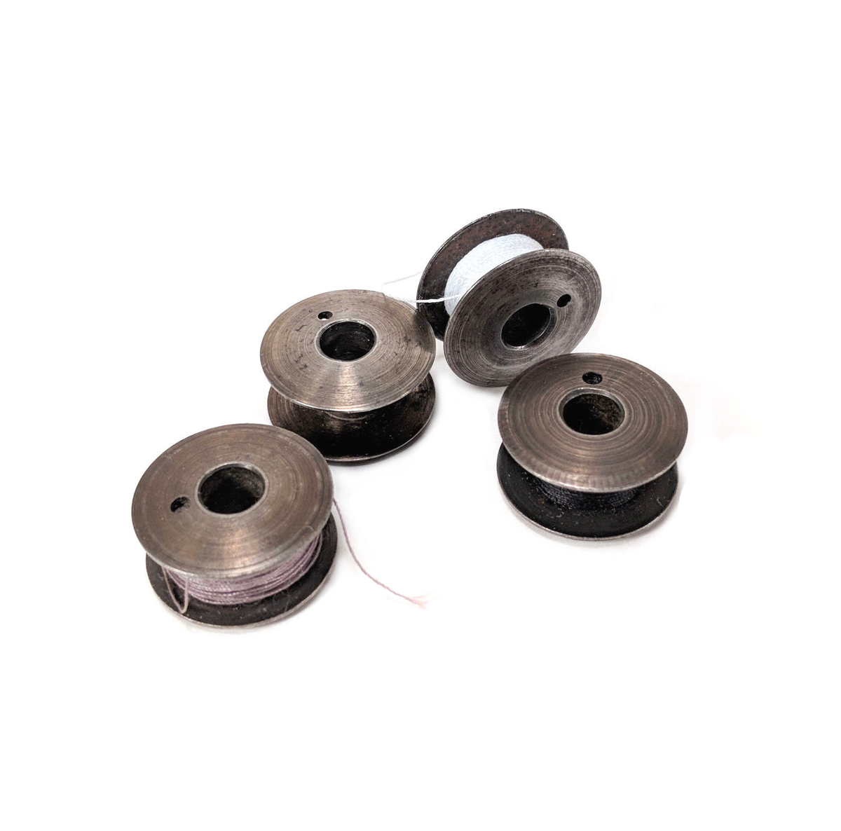 Blister of 5 rounded bobbins, for sewing machines, in 66 K steel