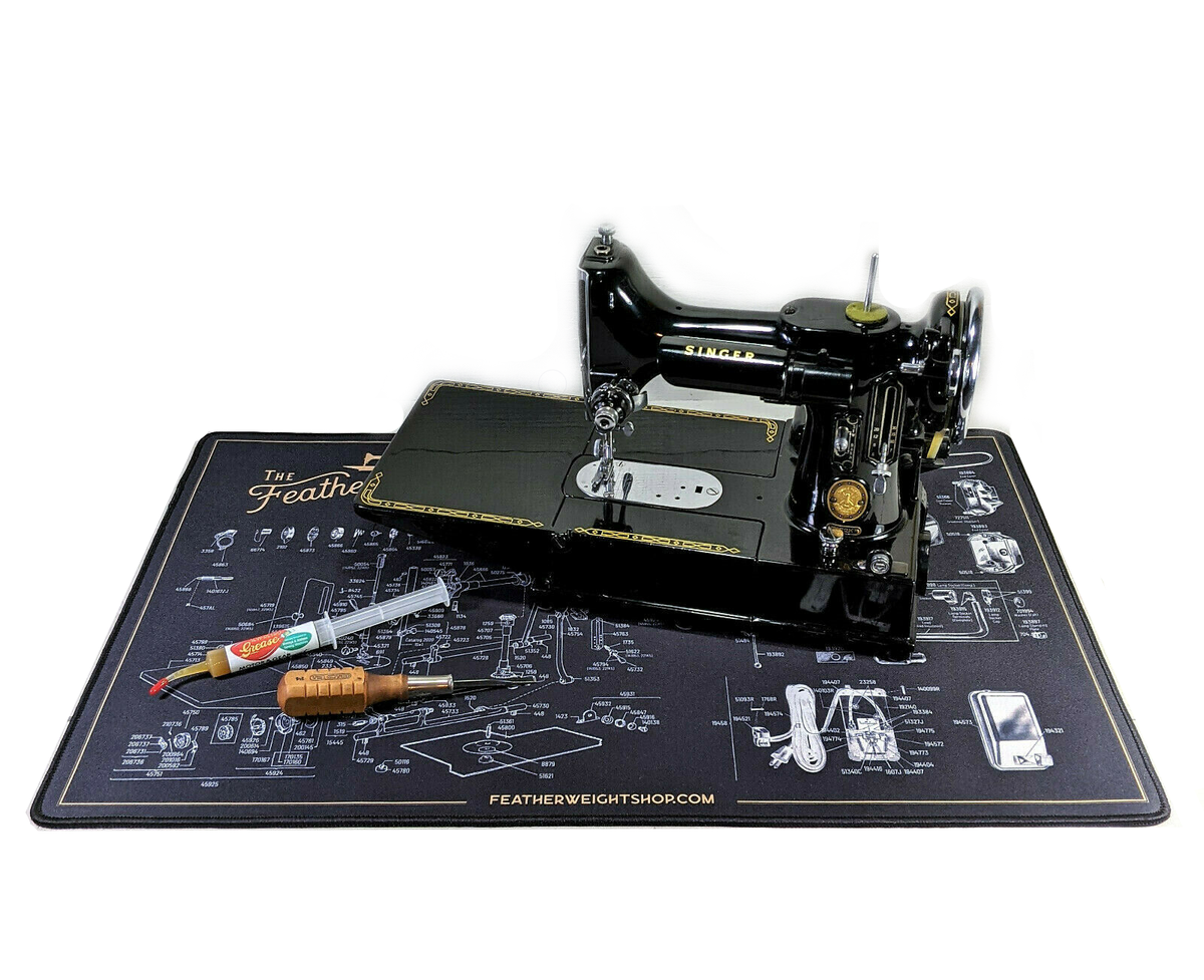 http://oldsingershop.com/cdn/shop/products/singer-featherweight-221-sewing-machine-schematic-service-work-mat-5_1200x1200.png?v=1647548200