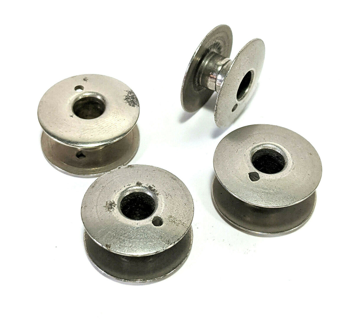 Blister of 5 rounded bobbins, for sewing machines, in 66 K steel